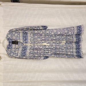 Cotton dress with tassles